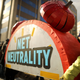 Rally organizers carry away props following a protest outside the Federal Communications Commission building against the end of net neutrality rules in Washington, D.C., on Dec. 14, 2017. (Chip Somodevilla/Getty Images)
